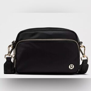 Lululemon Black Crossbody Bag with Mesh Pocket. NEVER BEEN USED!